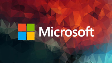 Microsoft logo on a colorful mozaic background