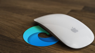 A Microsoft Edge logo underneath an Apple Magic mouse