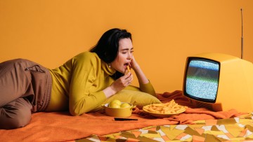 Image of a woman watching TV
